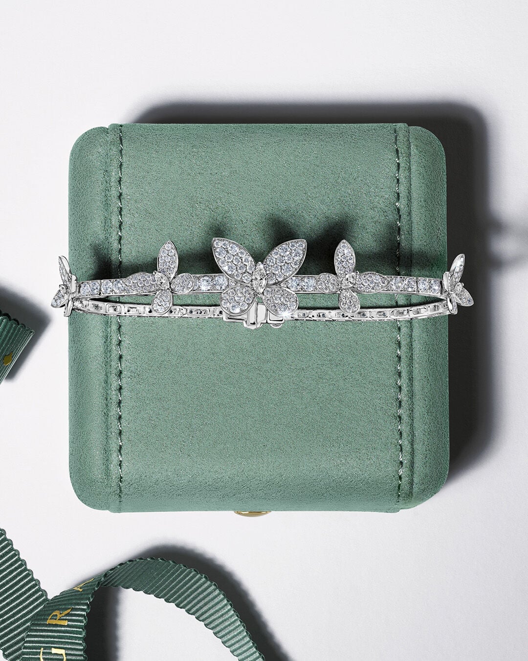 Image shows pav&eacute; butterfly diamond bracelet