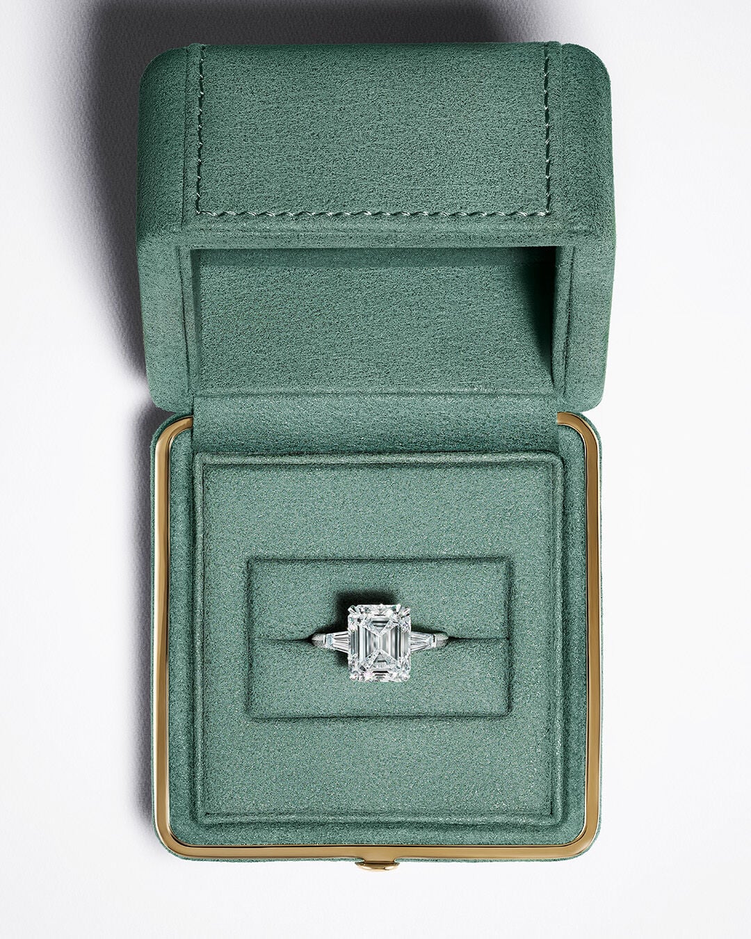 Engagement Rings - image shows Graff Emerald Cut Promise Engagement Ring in Graff ring box