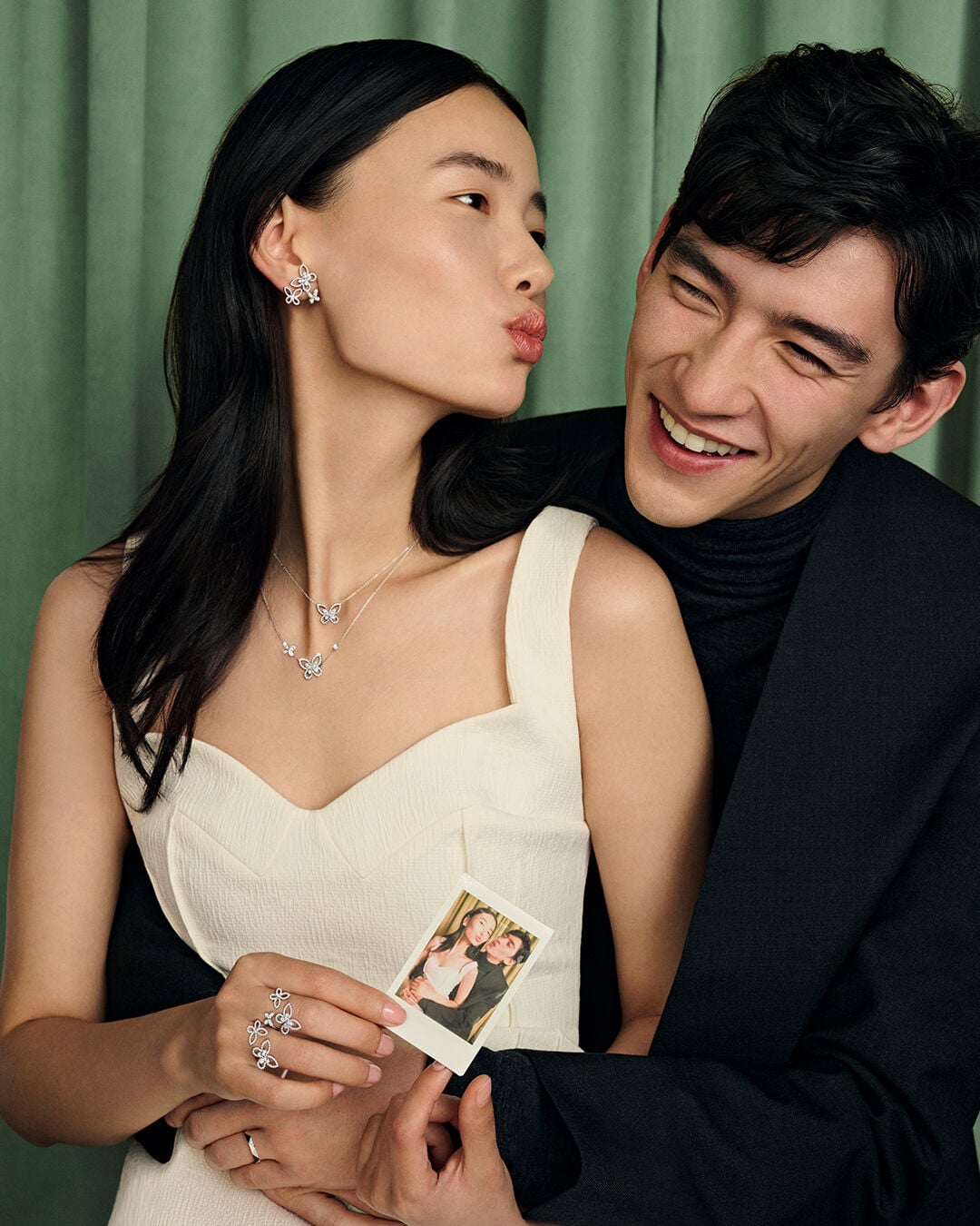 Image shows model wearing Graff Butterfly diamond jewellery