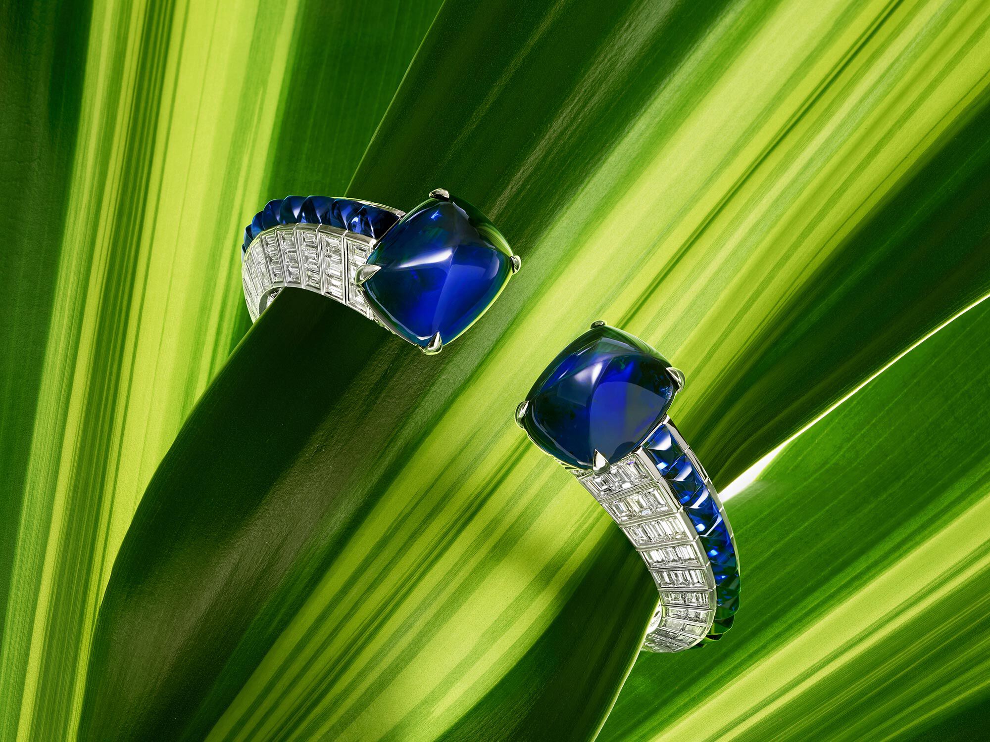 Modeal wears emerald and white diamond high jewellery suite