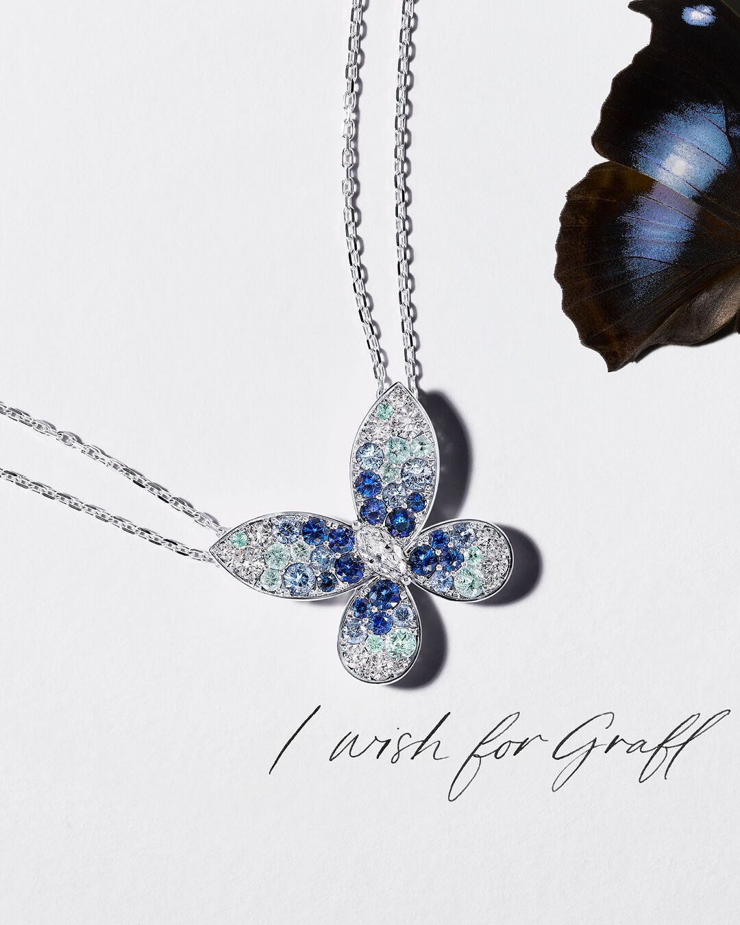 Gifts for her - image shows Graff Butterfly blue sapphire and tourmaline necklace 