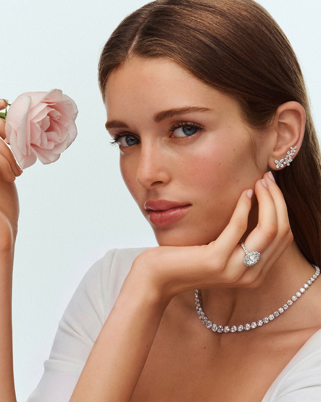 Engagement Rings - image shows model wearing Graff Butterfly Jewellery and Icon Engagement Ring