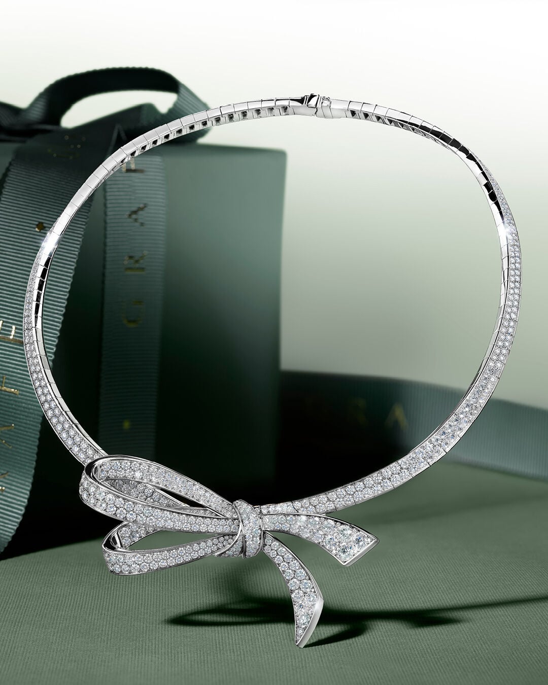Image shows model wearing Laurence Graff Signature rings and bangles