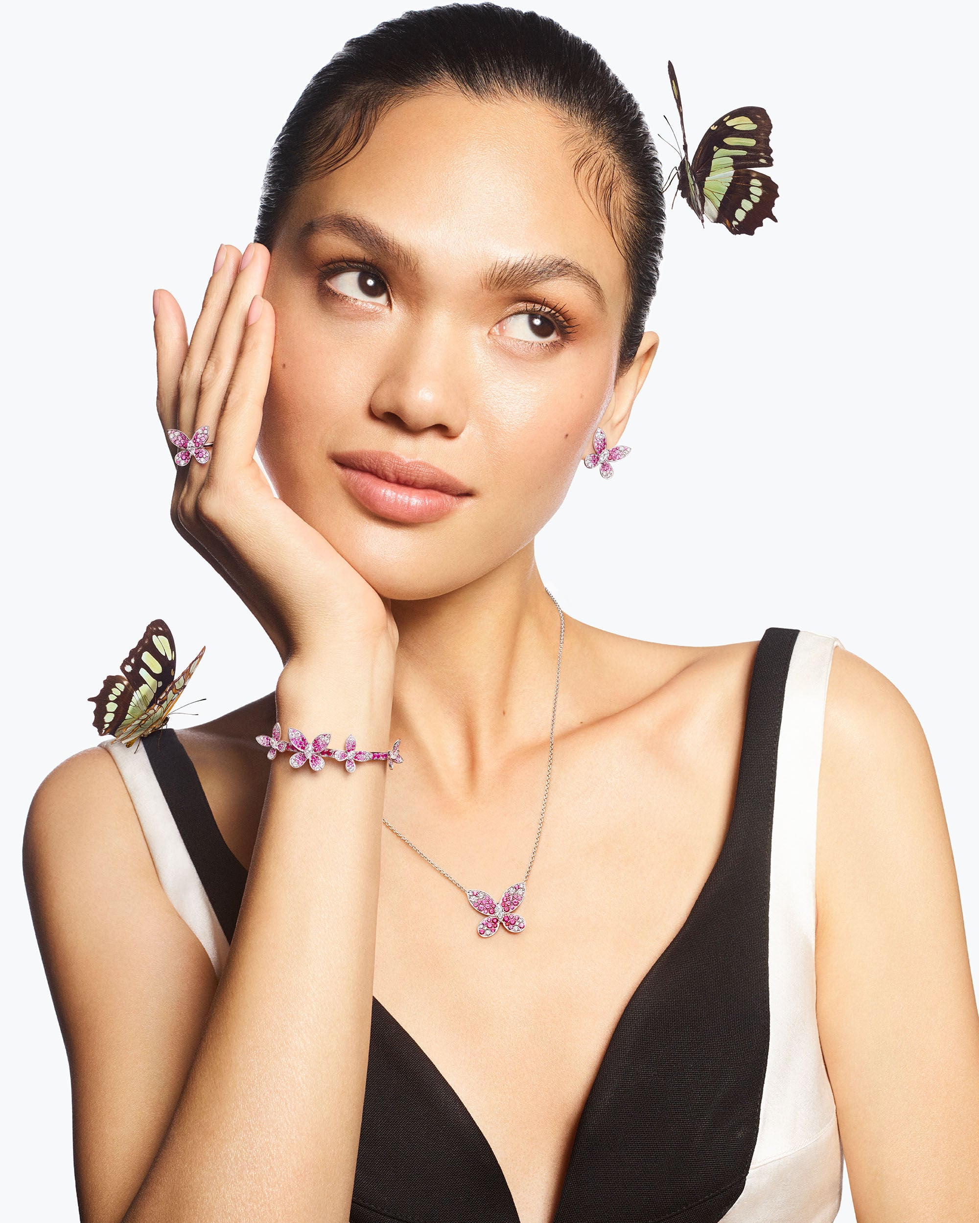 Image shows model wearing Graff Butterfly ring and earrings