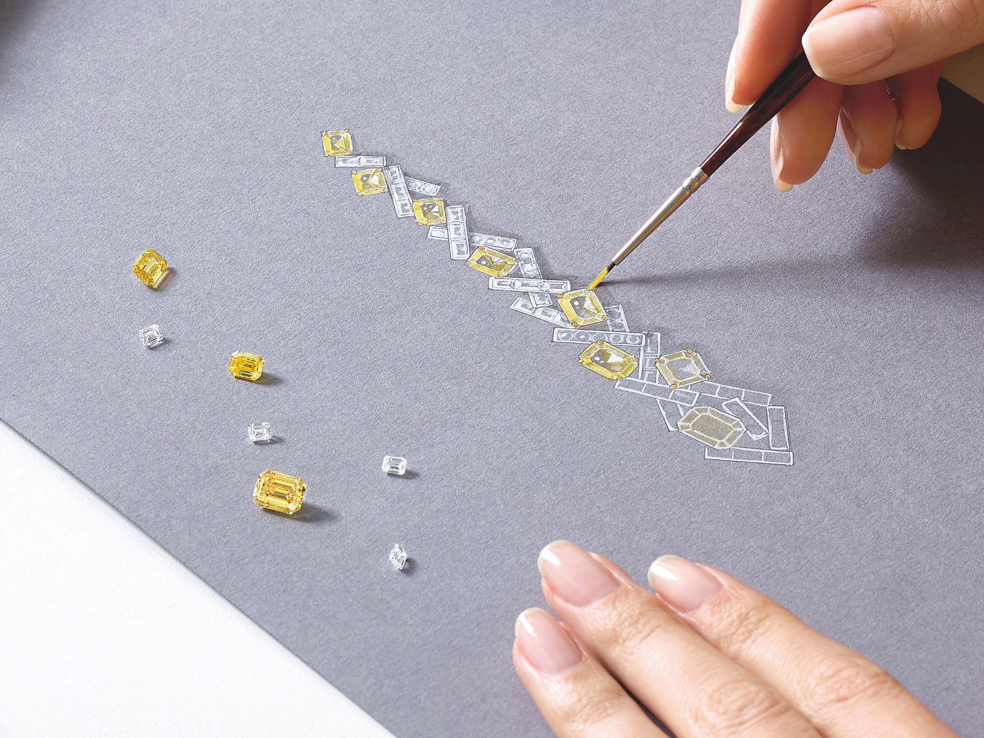 Graff Designer sketching high jewellery Earrings made of yellow diamonds and diamonds.
