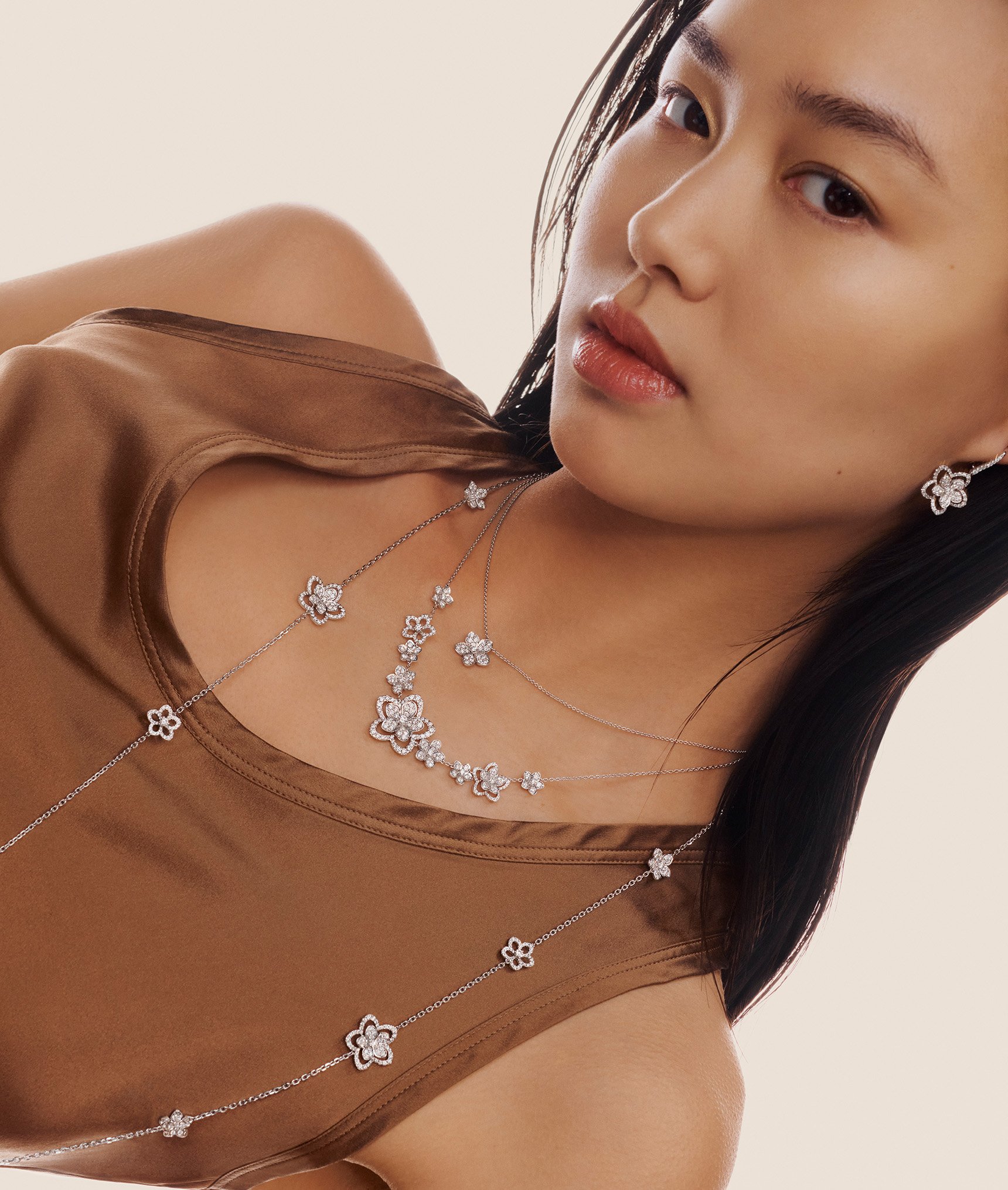 Model wears Wild Flower jewellery collection diamond jewellery