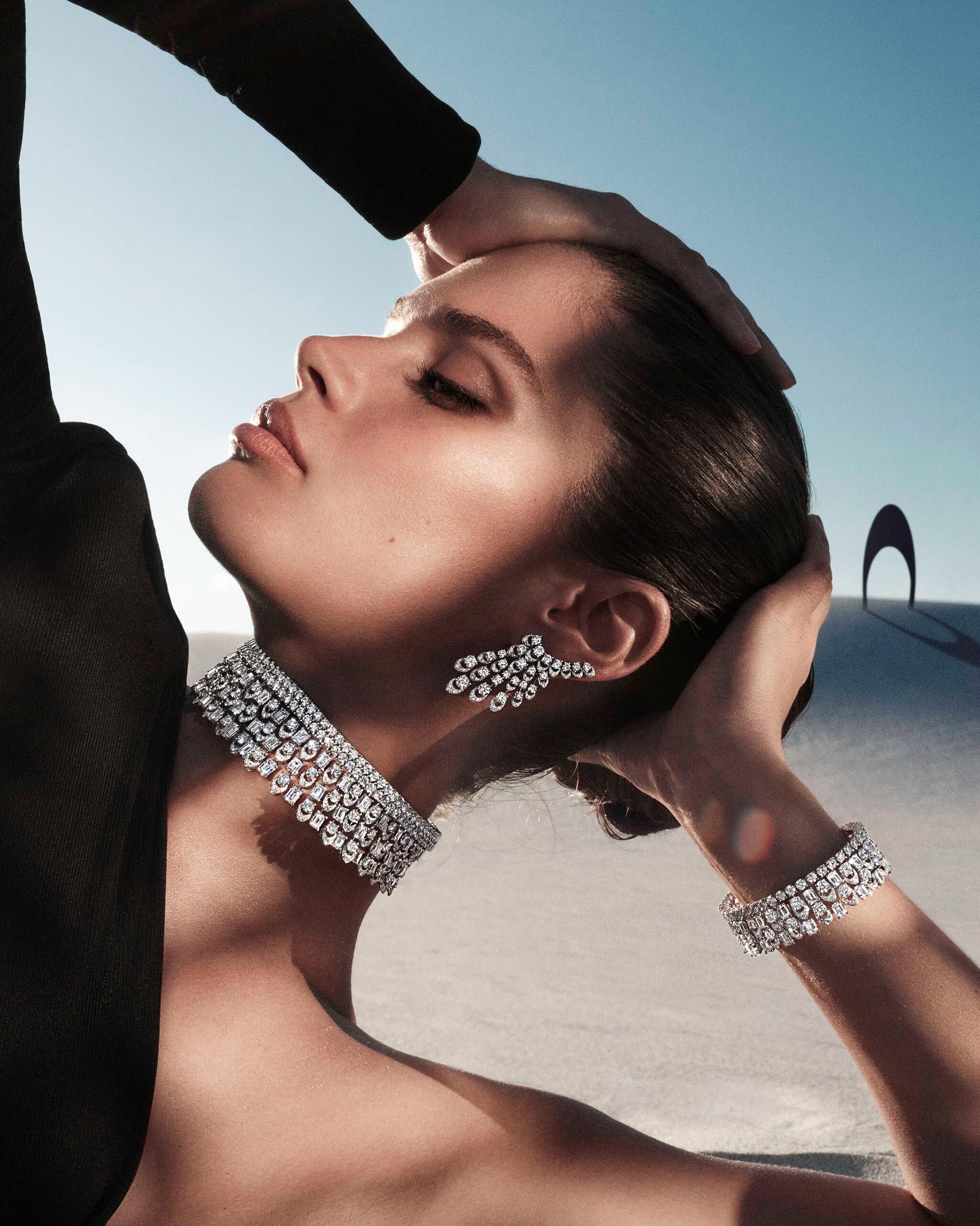 Model wears Graff Gateway diamond jewels from the Tribal collection, in a desert
